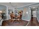 Formal dining room with hardwood floors and view of entryway at 6430 Sun Eagle Ln # 201, Bradenton, FL 34210