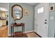 Inviting entryway with decorative mirror and charming console table at 6430 Sun Eagle Ln # 201, Bradenton, FL 34210