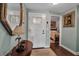 Bright entryway, view of bedroom and kitchen at 6430 Sun Eagle Ln # 201, Bradenton, FL 34210