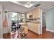 Eat-in kitchen with access to balcony at 6430 Sun Eagle Ln # 201, Bradenton, FL 34210