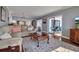 Spacious living room with hardwood floors, comfortable seating and views at 6430 Sun Eagle Ln # 201, Bradenton, FL 34210