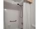 Shower stall with tiled walls and a handheld shower head at 6430 Sun Eagle Ln # 201, Bradenton, FL 34210