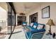 Bright sunroom with comfy seating and view at 6430 Sun Eagle Ln # 201, Bradenton, FL 34210