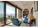 Sunroom with water view and seating area at 6430 Sun Eagle Ln # 201, Bradenton, FL 34210