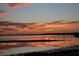 Stunning sunset over calm water with reflection at 6430 Sun Eagle Ln # 201, Bradenton, FL 34210