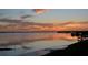 Stunning sunset over calm water with reflection at 6430 Sun Eagle Ln # 201, Bradenton, FL 34210