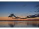 Tranquil waterfront view at sunset or sunrise at 6430 Sun Eagle Ln # 201, Bradenton, FL 34210