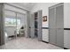 Bright living space with large sliding glass doors leading to a screened lanai and convenient closet storage at 6609 Stone River Rd # 206, Bradenton, FL 34203