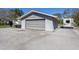 Detached garage with RV parking and large driveway at 6615 13Th E Ave, Bradenton, FL 34208