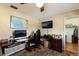 Home office features built-in desk, computer, and ample storage at 6615 13Th E Ave, Bradenton, FL 34208
