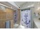 Walk-in shower with tiled walls at 6615 13Th E Ave, Bradenton, FL 34208