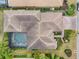 Bird's-eye view of a home with a pool and landscaping at 7033 Brier Creek Ct, Lakewood Ranch, FL 34202