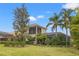 Elevated view of home with lush landscaping and pool area at 7033 Brier Creek Ct, Lakewood Ranch, FL 34202