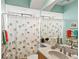 Fun bathroom with elephant themed shower curtain at 7033 Brier Creek Ct, Lakewood Ranch, FL 34202