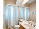 Guest bathroom with shower/tub combo and updated vanity at 7033 Brier Creek Ct, Lakewood Ranch, FL 34202