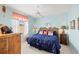 Spacious bedroom with King-size bed and decorative headboard at 7033 Brier Creek Ct, Lakewood Ranch, FL 34202