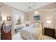 Cozy guest bedroom with window seating and decorative accents at 7033 Brier Creek Ct, Lakewood Ranch, FL 34202