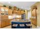 Gourmet kitchen with granite countertops and custom wood cabinetry at 7033 Brier Creek Ct, Lakewood Ranch, FL 34202