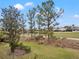 Landscaped view of the golf course and serene waterway at 7033 Brier Creek Ct, Lakewood Ranch, FL 34202