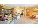 Spacious living area with an open floor plan and a view of the pool at 7033 Brier Creek Ct, Lakewood Ranch, FL 34202