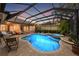 Relaxing pool and spa area with covered patio at 7033 Brier Creek Ct, Lakewood Ranch, FL 34202
