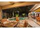 Expansive pool and patio with fire pit and seating at 7033 Brier Creek Ct, Lakewood Ranch, FL 34202