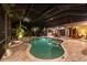 Inviting pool and spa, screened enclosure with lighting at 7033 Brier Creek Ct, Lakewood Ranch, FL 34202