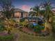Relaxing pool and spa area with screened enclosure and lush landscaping at 7033 Brier Creek Ct, Lakewood Ranch, FL 34202