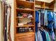 Large walk-in closet with ample shelving and hanging space at 7033 Brier Creek Ct, Lakewood Ranch, FL 34202