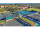A sprawling complex featuring pickleball and tennis courts, highlighting the community's active lifestyle at 7422 W Country Club N Dr, Sarasota, FL 34243