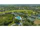 Resort-style community with tennis courts and pool at 7822 Allen Robertson Pl, Sarasota, FL 34240