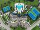 Aerial view of community amenities, including pools and courts at 8669 Rain Song Rd, Sarasota, FL 34238