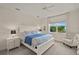Bright bedroom featuring a comfortable bed and ample natural light at 8669 Rain Song Rd, Sarasota, FL 34238