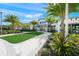 Resort-style community with lush landscaping and walkways at 8669 Rain Song Rd, Sarasota, FL 34238