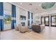 Elegant community lounge with fireplace and comfortable seating at 8669 Rain Song Rd, Sarasota, FL 34238