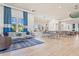 Spacious community room with seating area and kitchenette at 8669 Rain Song Rd, Sarasota, FL 34238