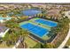 Community tennis courts with aerial view at 8669 Rain Song Rd, Sarasota, FL 34238
