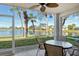 Enjoy serene lake views from this screened patio, perfect for outdoor dining at 9300 Clubside Cir # 1107, Sarasota, FL 34238