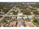 Aerial view showcasing a single-Gathering home with a pool in a residential neighborhood at 949 Chevy Chase St, Port Charlotte, FL 33948