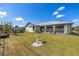 Large backyard with a shed and plenty of space for gardening at 949 Chevy Chase St, Port Charlotte, FL 33948