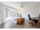 Comfortable bedroom with a queen bed, a dresser, and a home office area at 949 Chevy Chase St, Port Charlotte, FL 33948