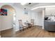 Bright kitchen features gray cabinets, modern appliances, and a breakfast nook at 949 Chevy Chase St, Port Charlotte, FL 33948