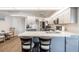 Updated kitchen featuring gray cabinets, stainless steel appliances, and island at 949 Chevy Chase St, Port Charlotte, FL 33948