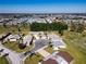 Large-scale aerial view of the neighborhood and surrounding area at 104 Carswell Cir # 10, Sun City Center, FL 33573