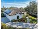 One story house with solar panels and pool, top-down view at 1060 Water Oak Ne Ct, St Petersburg, FL 33703