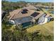 House with pool and solar panels on the roof at 1060 Water Oak Ne Ct, St Petersburg, FL 33703