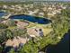 Aerial perspective highlighting a home's waterfront setting and canal views at 1060 Water Oak Ne Ct, St Petersburg, FL 33703