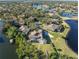 Aerial view of a house nestled in a quiet waterfront community at 1060 Water Oak Ne Ct, St Petersburg, FL 33703