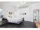 Main bedroom with dark grey flooring and neutral decor at 1060 Water Oak Ne Ct, St Petersburg, FL 33703