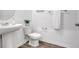 Clean and modern half bathroom with pedestal sink at 11630 Woodleaf Dr, Bradenton, FL 34211